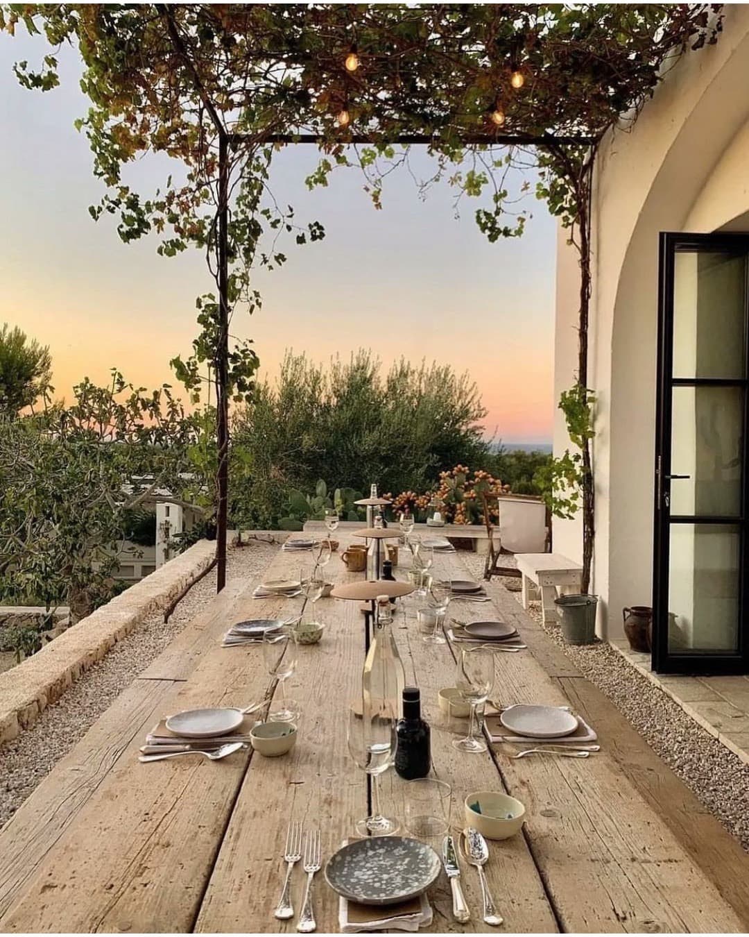 Table prepared for a private dinner at sunset